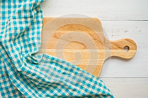 Top view of unused brand new brown handmade wooden cutting board