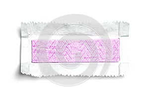 Top view of unwrapped chewing gum on white background