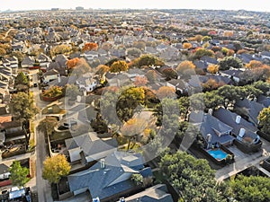 Top view urban sprawl suburbs Dallas during autumn season with c