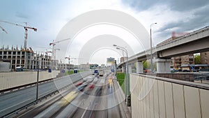 Top view of urban transport traffic on Begovaya street timelapse , Moscow photo