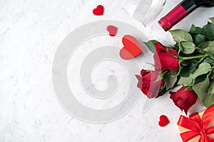 Top view of Valentine day gift with rose and wine, festive meal design concept