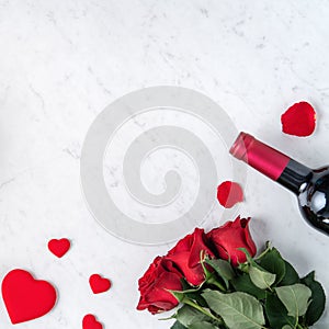 Top view of Valentine day gift with rose and wine, festive meal design concept