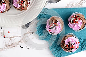 top view valentines day cupcakes on a napkin