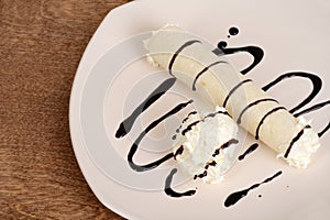 Top view vanilla ice cream crepe with chocolate sauce