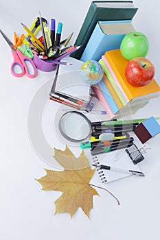 Top view.a variety of school supplies on a white background .photo with copy space