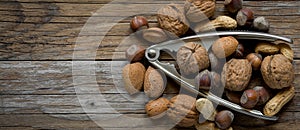 Top view of various  dried fruit and nutcracker