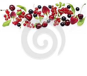 Top view. Various fresh summer berries on white background