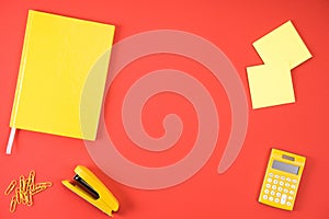 top view of various yellow office appliances