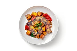 Top View Vegan Teriyaki Tofu Stirfry On White Round Plate On White Background. Generative AI