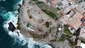 Top view of Vernazza, famous Cinque Terre town. Summertime daylight drone shot