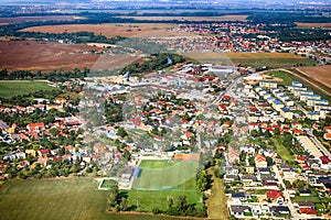 Top view of a village, agricultural field and soccer field near Bratislava, Slovakia