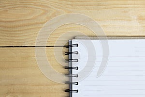 top view of a vintage desk and a book blank page. copy space