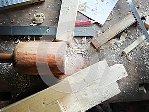 Top of view vintage old carpenter tools in a carpentry workshop, hand saw, home wood kit closeup