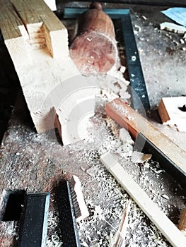 Top of view vintage old carpenter tools in a carpentry workshop, hand saw, home wood kit closeup