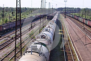 Top view of wagons with cisterns and railroad tracks