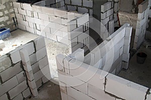 top view of walls under construction of foam blocks in walls of country house