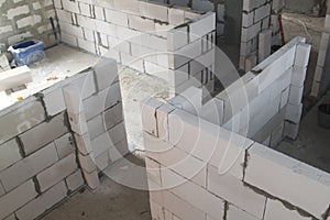 top view of walls under construction of foam blocks in walls of country house