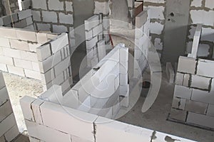 top view of walls under construction of foam blocks in walls of country house