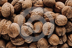 Top view of walnuts in nutshells