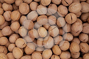 Top view of walnuts in nutshells