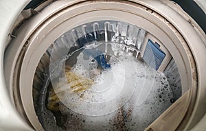 top view wash dirty clothes in washing machine