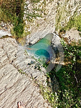 Top view of the waterfall among the rocks