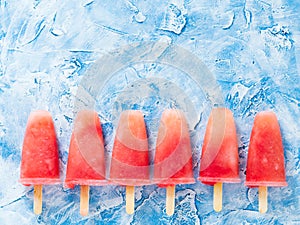 Top view of watermelon popsicles with copy space