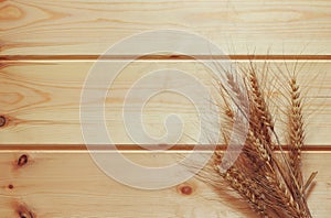 Top view of whet crop on wooden table