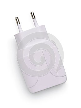 Top view of white plastic electric wall charger plug