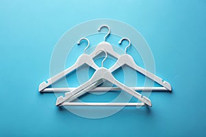 Top View of White Plastic Hangers photo