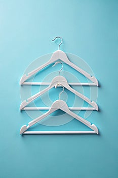 Top View of White Plastic Hangers photo
