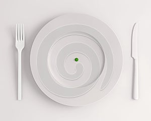 Top view white plate with a  green pill fork and knife on a COLOR background