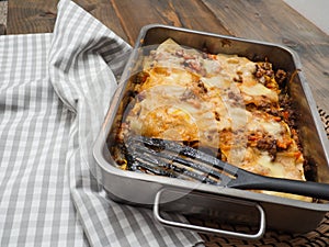 Top view of a whole lasagne in an ovenproof dish