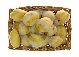 Baby potatoes in a small wicker basket