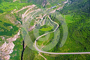 Top view of the winding mountain serpentine road near the sights of Armenia gorge