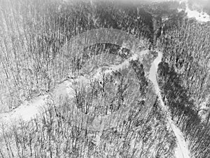 Top view of a winter forest. with hairpin bend