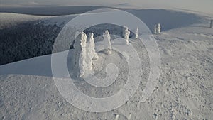 Top view of winter landscape with stone pillars. Clip. Miracle of nature on plateau with stone pillars in snow on winter