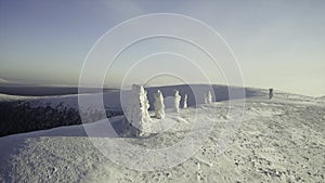 Top view of winter landscape with stone pillars. Clip. Miracle of nature on plateau with stone pillars in snow on winter