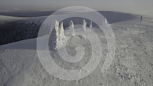 Top view of winter landscape with stone pillars. Clip. Miracle of nature on plateau with stone pillars in snow on winter