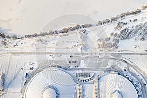 Top view in winter of a modern sports complex with parking in Minsk. Belarus photo