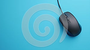 Top view of a wired mouse on a blue background