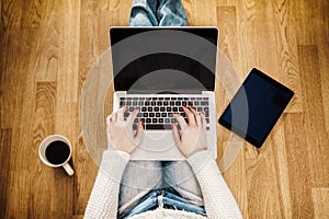 Top view of a woman with a computer