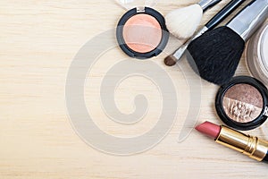 Top view of woman earth tone cosmetics