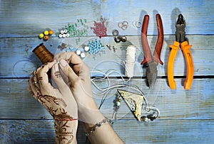 Top view of woman hand making handmade ceramic accessories