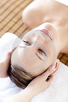 Top view of a woman having a head massage