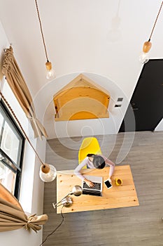 Top view of woman use of the notebook computer