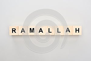 Top view of wooden blocks with Ramallah lettering on white background.