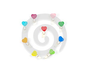 Top view Wooden colorful Paper Clip Heart set isolate on white b