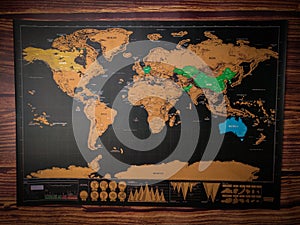 Top view world map on a blue wooden