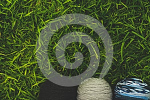 Top view of worsted yarn on the grass photo
